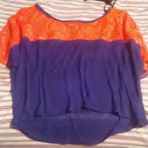 A cute orange and navy crop top